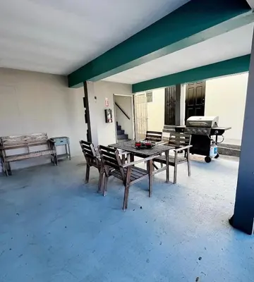 a patio with a table and chairs and a piano at Idyllic 1BR APT in Ocean Beach in San Diego
