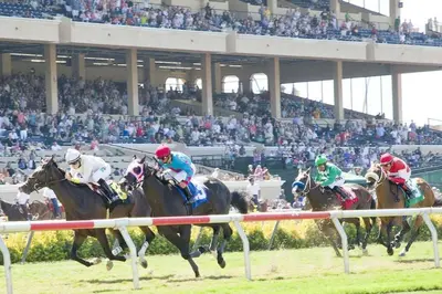 a group of jockeys racing horses at a horse race at Geometric Loft: renovated, hip, pets, pool/spa in Solana Beach