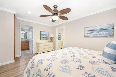 a bedroom with a bed and a ceiling fan at Three Bedroom Home on 36th with Indoor Outdoor Living in Newport Beach