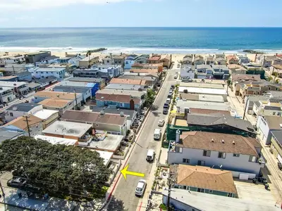 an aerial view of a town next to the ocean at Three Bedroom Three Bath Home w Patio 1 block from beach in Newport Beach