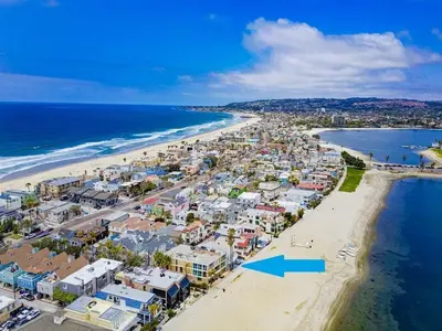 an aerial view of a beach with a blue arrow at Bayside 1 in San Diego
