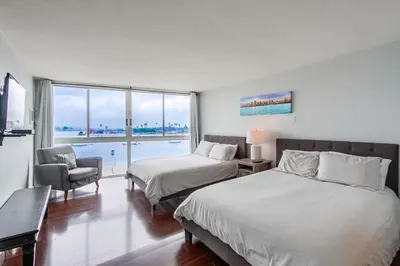 a hotel room with two beds and a window at Waterfront 1 in San Diego