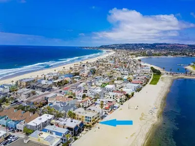 an aerial view of a beach with a blue arrow at Waterfront 1 in San Diego