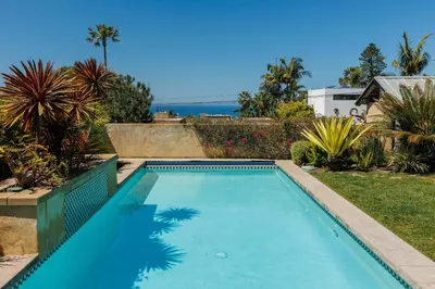 a swimming pool in the backyard of a house at SB-316 - Sunset Hacienda in Solana Beach