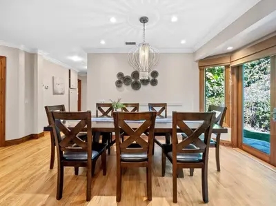 a dining room with a table and chairs at Ocean-View Mountaintop Getaway. Jacuzzi/Ping-Pong! in San Diego