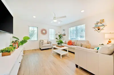 a living room with a couch and a table at Bayside Cove 5 in San Diego