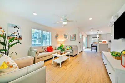 a living room with a couch and a table at Bayside Cove 5 in San Diego