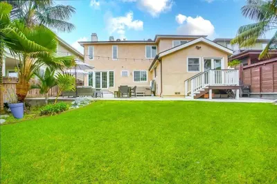a large house with a lawn in front of it at Grandview 2 in Encinitas