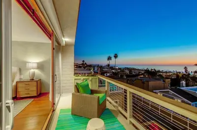 a balcony with a view of the ocean at Seaside in Cardiff-by-the-Sea
