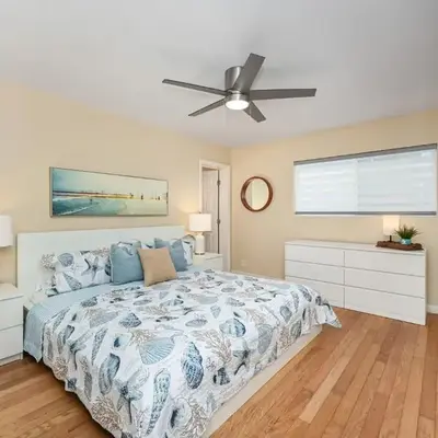 4 bedroom home with Patio 10 seconds from the Sand