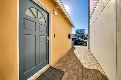a door on the side of a building at Perfect 3 Bedroom Home between the Bay and Beach in Newport Beach