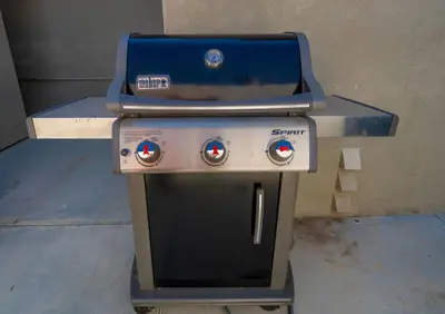 a stove with a blue top on top of it at Cozy Beachside Studio in San Diego