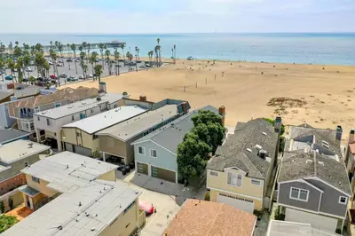 an aerial view of a beach with houses and condos at 3 Bedroom Home in Balboa - Walk to Pier & Restaurants in Newport Beach