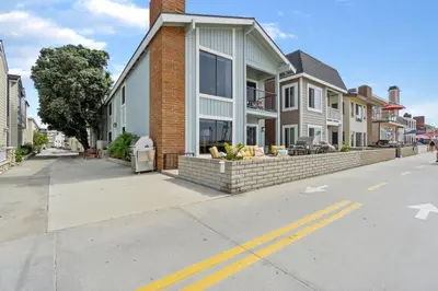a house on the side of a street at 2 Bedroom Home on the Beach with Ocean View in Newport Beach
