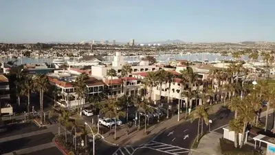 an aerial view of a city with palm trees and buildings at 3 Bedroom home on the beach steps from Balboa Pier in Newport Beach