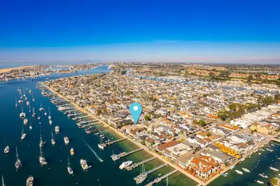 an aerial view of a harbor with boats at Balboa Island Luxury Penthouse Suite With Bay Views in Newport Beach