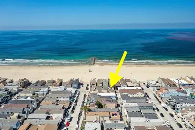an aerial view of a city and the beach at 1 House from the Sand with Rooftop Deck on 28th Street in Newport Beach