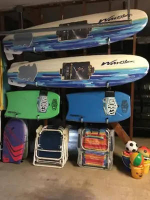 a stack of surfboards on top of each other at Oceanfront Back Home with View of the Sea in Newport Beach