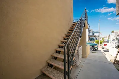 a stairway leading up to a building at 3 Bedroom Luxury Home Steps to Balboa Fun Zone in Newport Beach