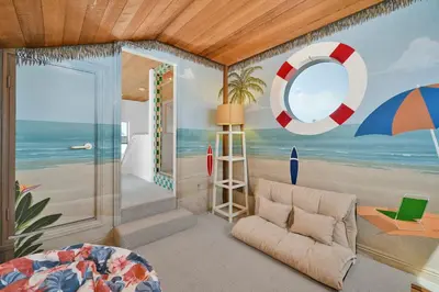 a living room with a view of the beach at 4 bedroom Home in Quiet Neighborhood near Beach in Newport Beach