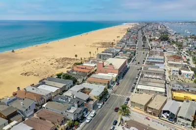 an aerial view of a city and the beach at 2 Bed 2 Bath BACK APT Steps to the Sand in Newport Beach