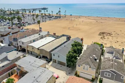 an aerial view of a beach with houses and the ocean at 2 Bed 2 Bath BACK APT Steps to the Sand in Newport Beach