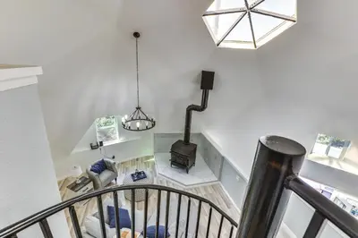 an overhead view of a living room with a staircase at North San Diego Retreat with Deck, Fire Pit Table! in Escondido