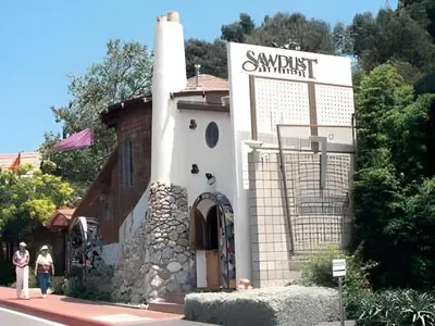 a building with a sign on the side of it at Laguna Brisas - A Beach Hotel in Laguna Beach