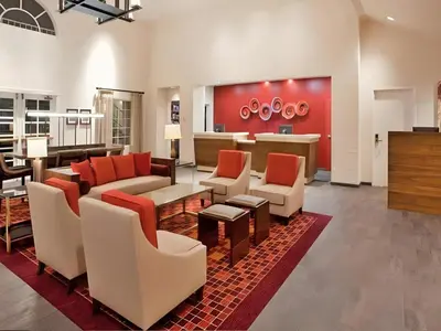 a large living room with couches and chairs at Hotel San Diego-Rancho Bernardo in Rancho Bernardo