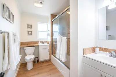 a bathroom with a toilet and a shower and a sink at CBS-1236 - Sensational Summit Sunsets in Cardiff-by-the-Sea