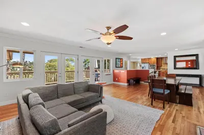 a living room with a couch and a ceiling fan at Executive Retreat - Renovated - Spacious - Views in La Mesa