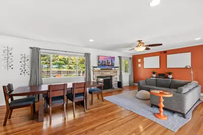 a living room with a table and a couch at Executive Retreat - Renovated - Spacious - Views in La Mesa