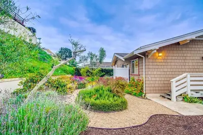 a garden in front of a house at Villa Solamar-Sunset Cliffs Spectacular in San Diego
