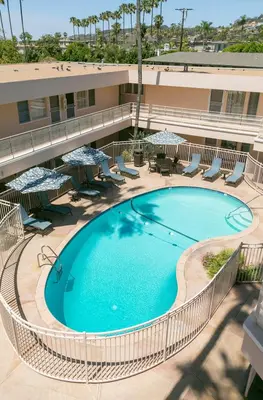 an overhead view of a swimming pool at a hotel at La Jolla Riviera Inn in San Diego