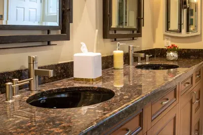 two sinks in a bathroom with two mirrors at Stunning huge one level 1350 ft. cottage in Mission Viejo