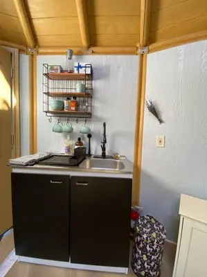 a kitchen with a sink and a counter top at Glamping-Sky Dome Yurt-Tiny House-2 modern composting toilet in Valley Center