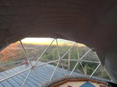 a view from the top of a building with a roof at Sunset Dome - Outdoor Shower/Composting Toilet in Valley Center
