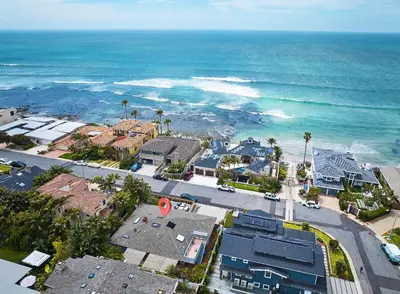 an aerial view of a beach with houses and the ocean at Family Beach house in Carlsbad