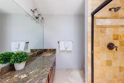 a bathroom with a sink and a shower at SB-6758 - Italian Coastal Getaway in Solana Beach
