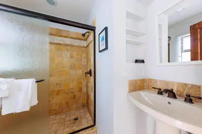 a bathroom with a shower and a sink at SB-6758 - Italian Coastal Getaway in Solana Beach