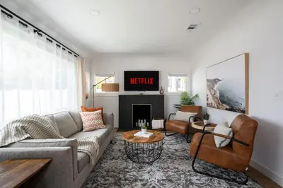 a living room with a couch and a fireplace at *Golden Getaway* 5 Beds / 8 Minutes to Downtown in San Diego