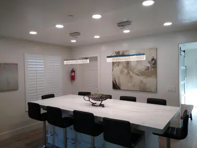 a conference room with a table and chairs at Luxury Resort•POOL/SPA/Golf/Grill/Games/Sleep 40+ in Lakeside