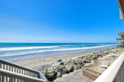 a view of the beach from the balcony at Oceanfront 1BR, Fully Furnished, Gated Parking in Oceanside