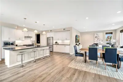 a kitchen and dining room with a table and chairs at King Size, Patio, Xbox, Great Park in Irvine