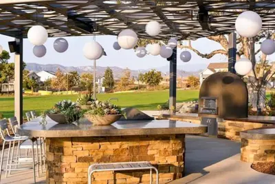 a patio with a table and chairs and lights at King Size, Patio, Xbox, Great Park in Irvine