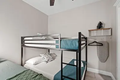 a bunk bed room with two bunk beds at Good Life Resorts in San Diego