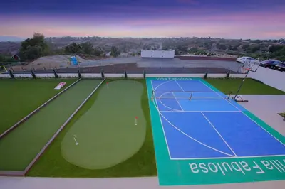 an aerial view of a tennis court at An Architectural masterpiece with unparalleled beauty, elegance and amenities in Temecula