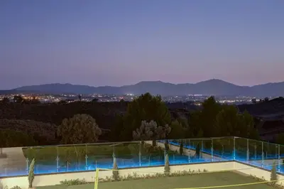 a building with a glass roof with a view at An Architectural masterpiece with unparalleled beauty, elegance and amenities in Temecula