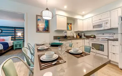 a kitchen and dining room with a table and chairs at San Diego - Mission Valley Condos in San Diego