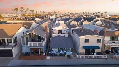 an aerial view of a town with houses at Surfrider I by AvantStay Walk to the Beach Patio in Newport Beach